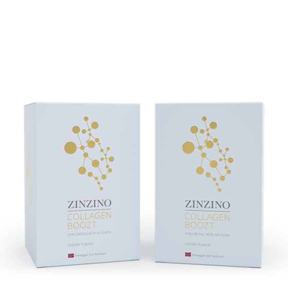 Dos cajas rectangulares blancas de Zinzino Collagen Boozt con sabor a cereza, con un diseño molecular dorado minimalista y el texto del producto en la parte delantera, sobre un fondo claro liso. Perfecto para el aporte diario de colágeno.